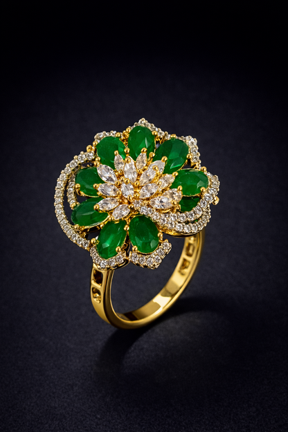 Shop emerald floral crystal ring by Vellorene. Elegant gold-tone fashion jewellery with vibrant design, perfect for gifting and export collections.