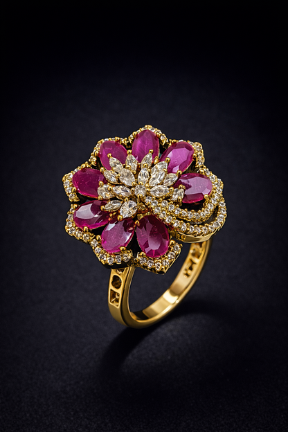 Shop ruby floral crystal ring by Vellorene. Elegant gold-tone fashion jewellery with vibrant design, perfect for gifting and export collections.