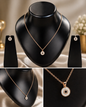Vellorene rose gold minimal evil eye pendant necklace on black display stand